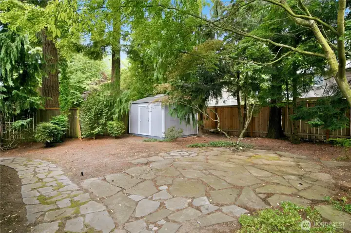 Flat, usable backyard with ultimate privacy.