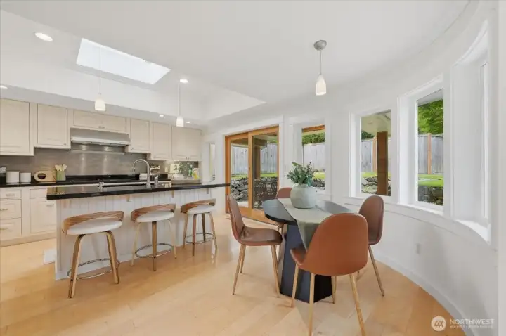 Kitchen has seating at the Island, plus a Dining Nook