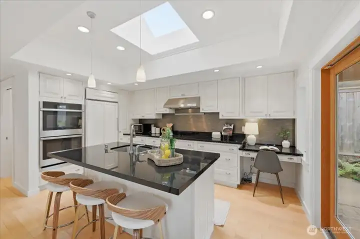 Custom Cabinets, Sub-Zero refrigerator and Stainless Appliances