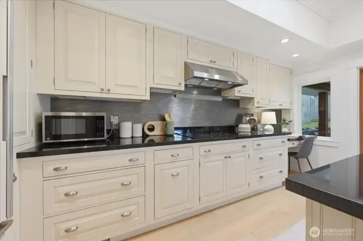 Thoughtfully designed Kitchen has Wood Mode Cabinets.