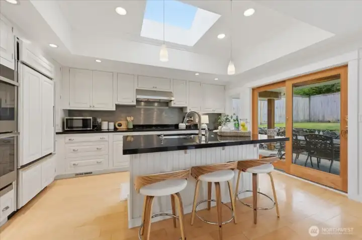 Kitchen opens to Covered Outdoor Seating