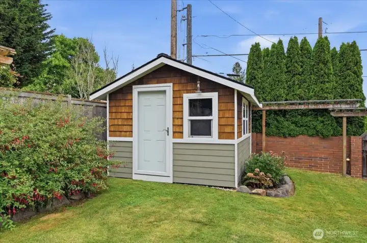 Detached Shed has Power and Lights.  Outdoor Office?