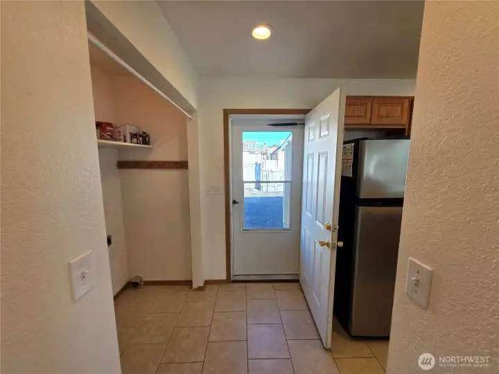Door off kitchen/laundry to the carport Door off kitchen/laundry to the carport