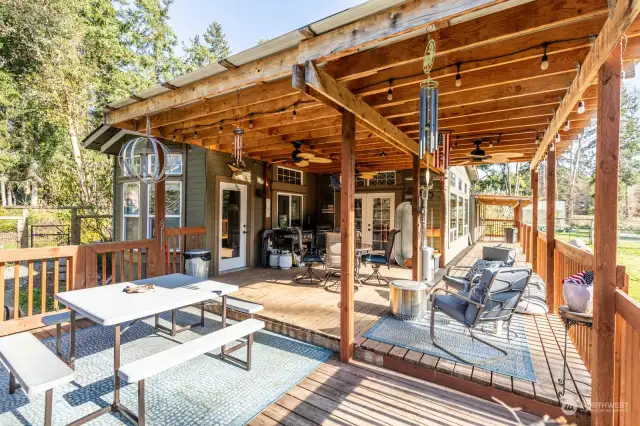 Looking for the perfect spot for your morning coffee or a great space to entertain? Look no further than this beautifully outfitted covered deck.