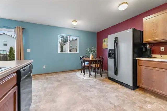 Spacious dining area and sliding door to backyard