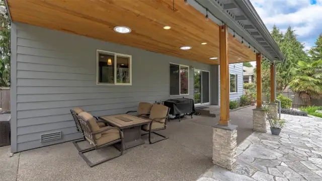 Walk out the door onto a beautiful covered patio with plenty of space for BBQs, gatherings, seating, and all your outdoor recreation