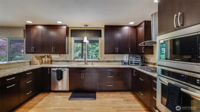Enjoy these beautiful granite countertops, complemented by plenty of cabinet space and extra storage to meet all your needs