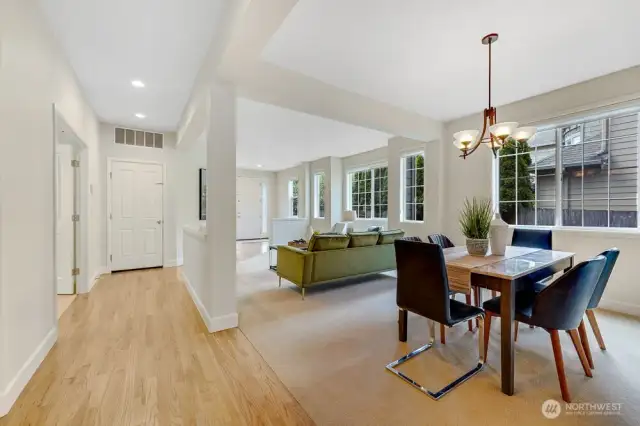 Formal dining room, formal living, and den/5th bedroom to the left on main floor.