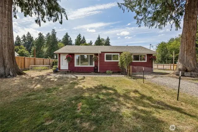Fully fenced yard with garden beds and room for all the critters!