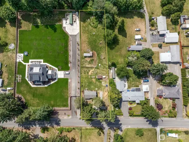 Take a look at this huge lot! Just a bit shy of an acre with cross fencing and outbuildings. Room for you to have some fun!
