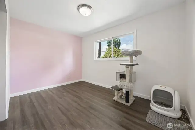 First bedroom with a fun accent wall.