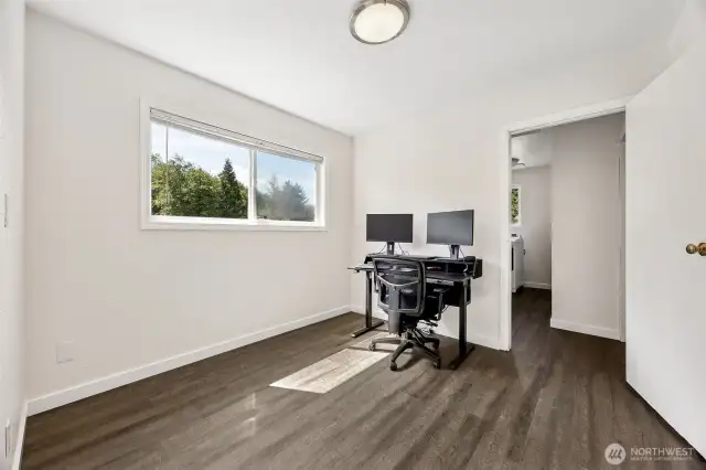 Second "middle" bedroom, currently being used as an office. Door leads to utility room and back bedroom.