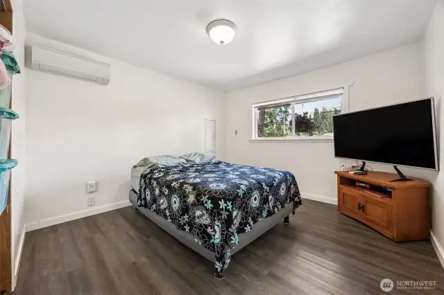Third bedroom, with mini-split for comfort. This house uses every square inch of space and lives larger than the square footage says it is.