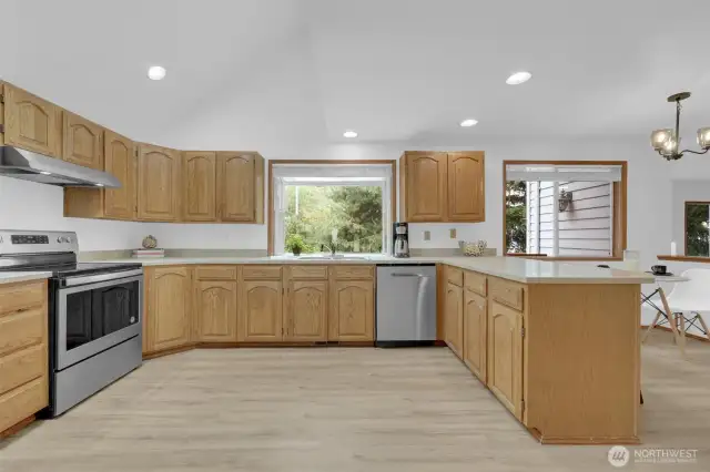 Wonderfully spacious kitchen with lots of cabinets & counter space. Stainless steel appliances plus a garden window over the sink