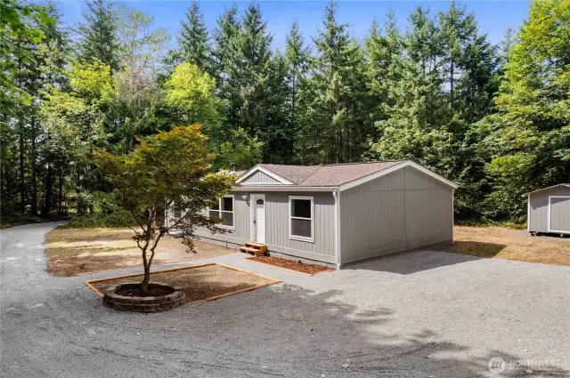 Fresh gravel gives plenty of parking, including RV parking, with a potential for a shop/detached garage