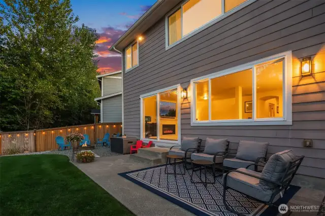 The living room steps out onto this spacious patio through the extra large sliding glass doors pictured here.