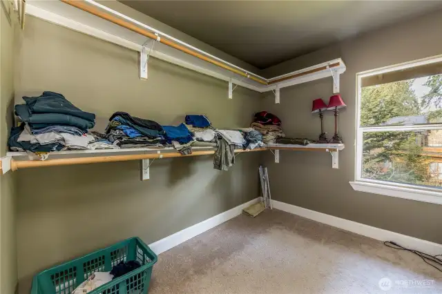Main suite walk in closet off back end of bathroom.