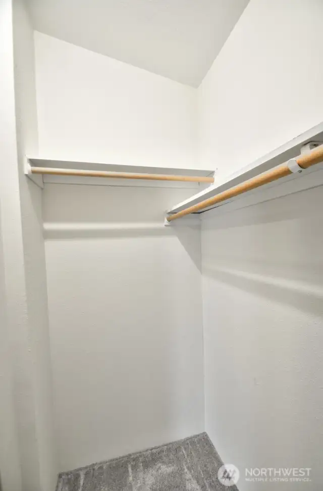 Spacious walk in closet in primary suite