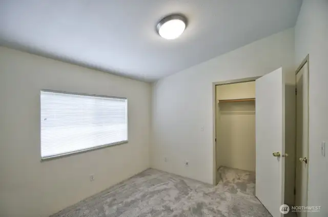 Bedroom with walk in closet