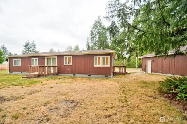 Back view from the property line of home and shop