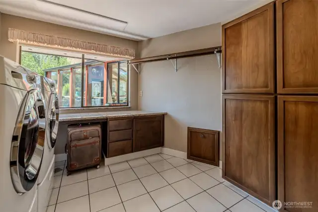 Laundry room on main level with laundry drawer attached to primary bedroom