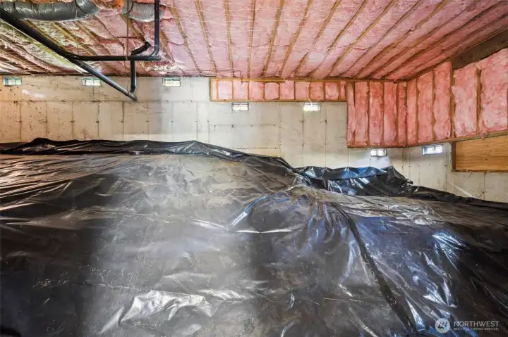 This super tidy crawl space was redone in the last few years with new vapor barrier and insulation.  A big, money saving extra not always considered in a home purchase.  Easy access to kitchen plumbing too.