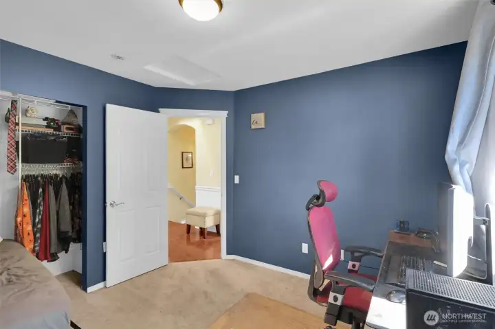 Spacious bedroom offers plenty of personal space.
