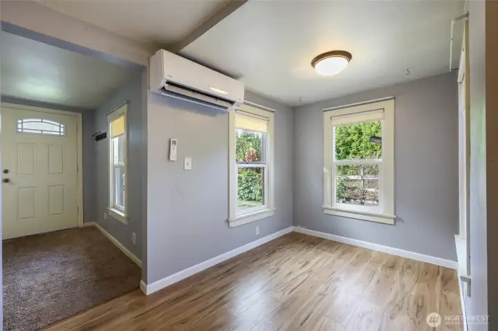 This may be the favored place to enjoy the greenery outside... surrounded by three windows and so lush a view!