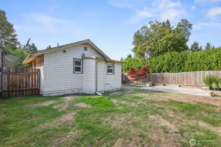 The far side of the home also has a gate--solid and wide-- which simply appears as fencing to the front view.