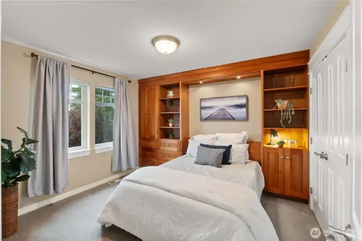 This awesome room has a built-in murphy bed with a pull down desk and added storage.
