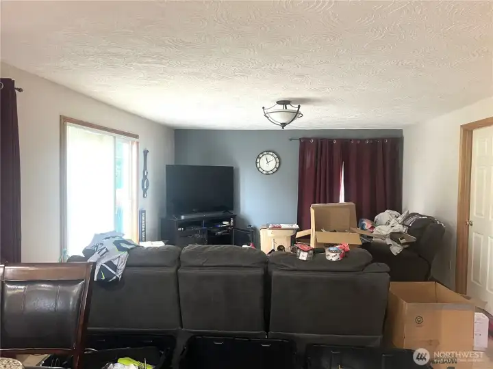 Living room with slinder to the back deck