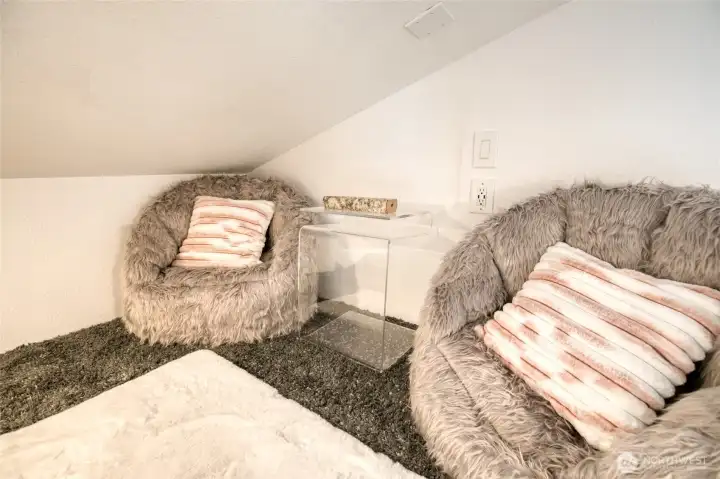 Super cute sitting area up in the loft.  Great place to cozy up with a book!