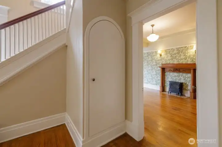 Charming coved coat closet.
