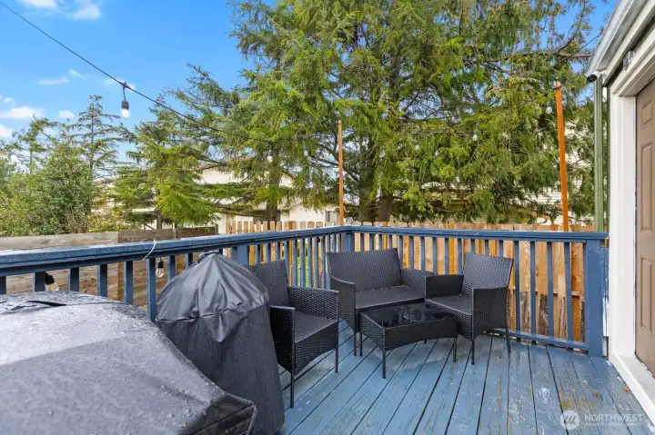 Private outdoor living area off the kitchen - perfect for grilling and entertaining.