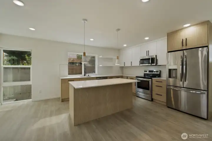 Room for a small eat in dining area as well as bar stool counter seating