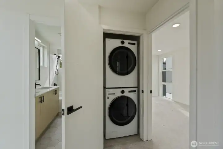Washer and dryer located at top of the stairs