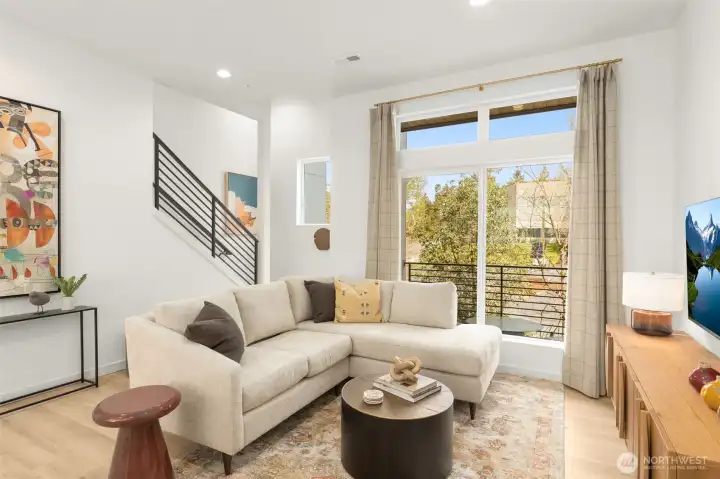 Covered deck on this level extends living and entertaining space! Photo is of model home of same floorplan.  Color schemes and finishes will vary per plan.