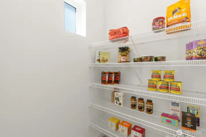 There is even a walk-in pantry!! Photo is of model home of same floorplan.  Color schemes and finishes will vary per plan.