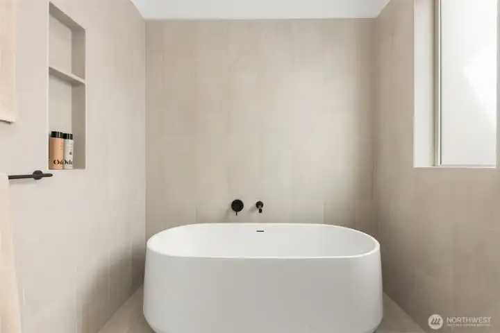 Just looking at the tub makes you go "Ahhhhhh!" Photo is of model home of same floorplan.  Color schemes and finishes will vary per plan.
