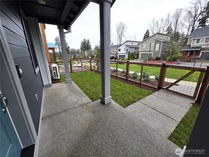 Backyard with a gate with community walking path access.  Home is fully fenced. Actual home is under construction and materials, colors, and finishes will vary. See site agent for details.