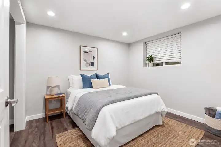 additional bedroom downstairs (virtually staged)