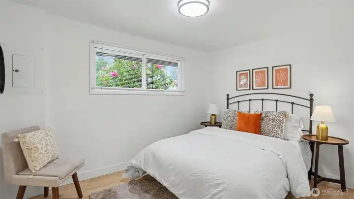Retreat to the primary bedroom with an en-suite bathroom.