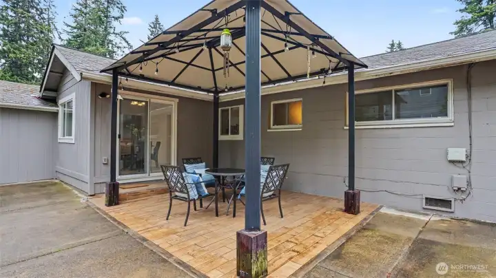 Covered patio area designed for year-round outdoor enjoyment.