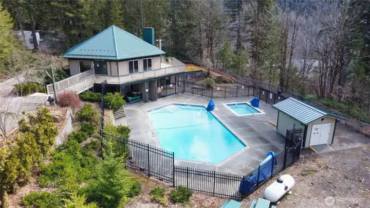 Bird's eye view of clubhouse with pool and hot tub