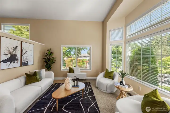 Gorgeous living room with high ceiling and tons of natural light