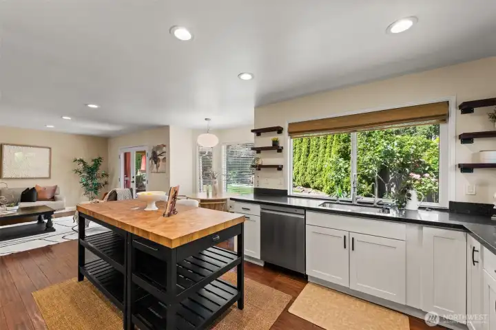 Kitchen with window that  overlooking to the resort-style backyard