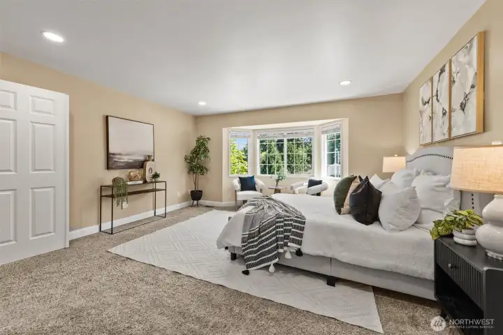 Large master bedroom with sitting area