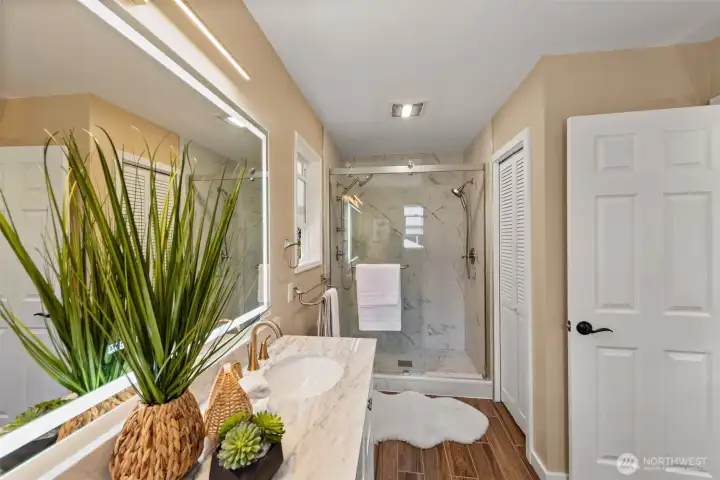 Master bathroom with vanity mirror