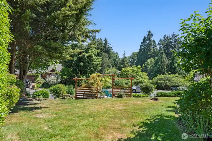 Custom built pergola that adds character to the beautiful landscape