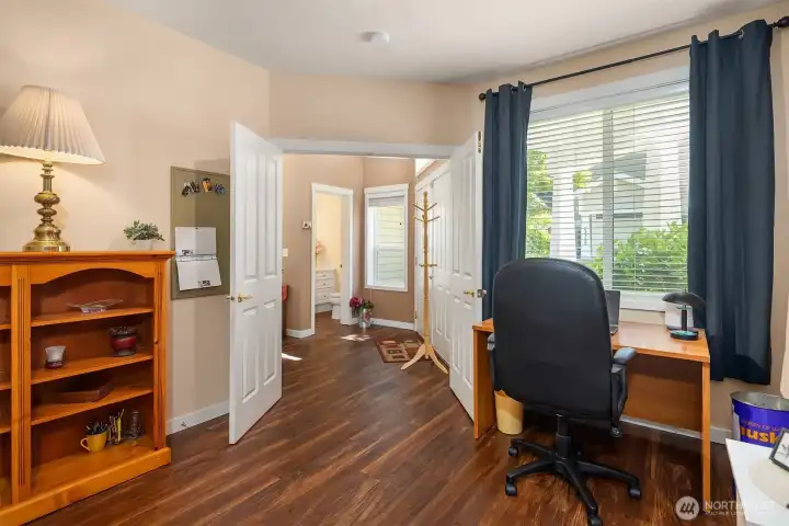 Double doors leading into the main level den Double doors leading into the main level den